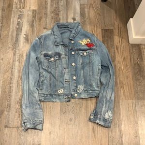 Girls ripped jeans jacket super cute to wear in the fall with patches